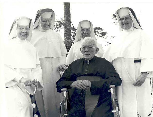 Monsignor William Barry attending the groundbreaking ceremony of the Library